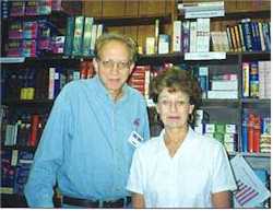 Al Hodges and Joan Hill, one of the owners of the Bible Disscount Store in Commerce City